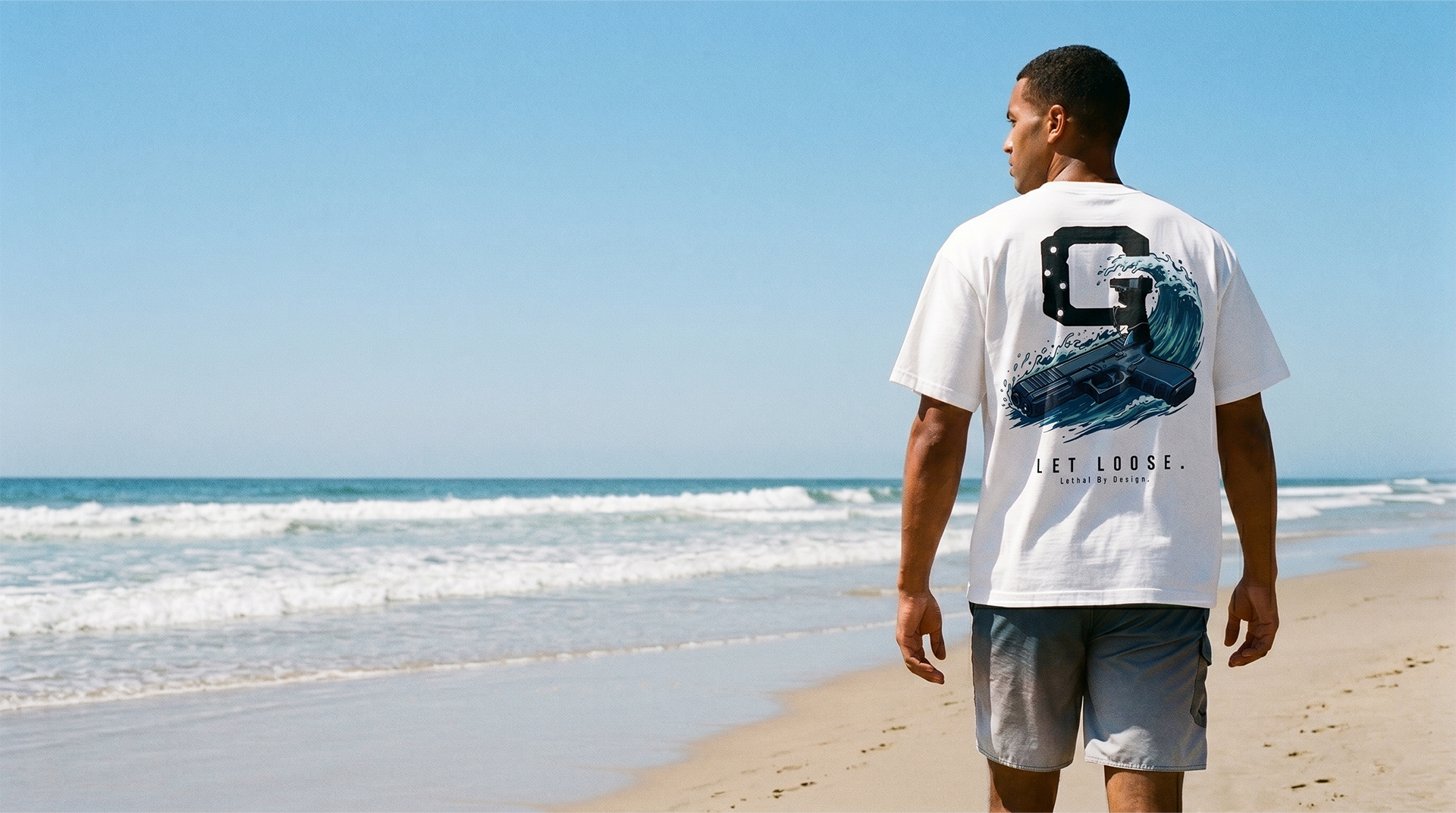 Let Loose tee on a model at the beach